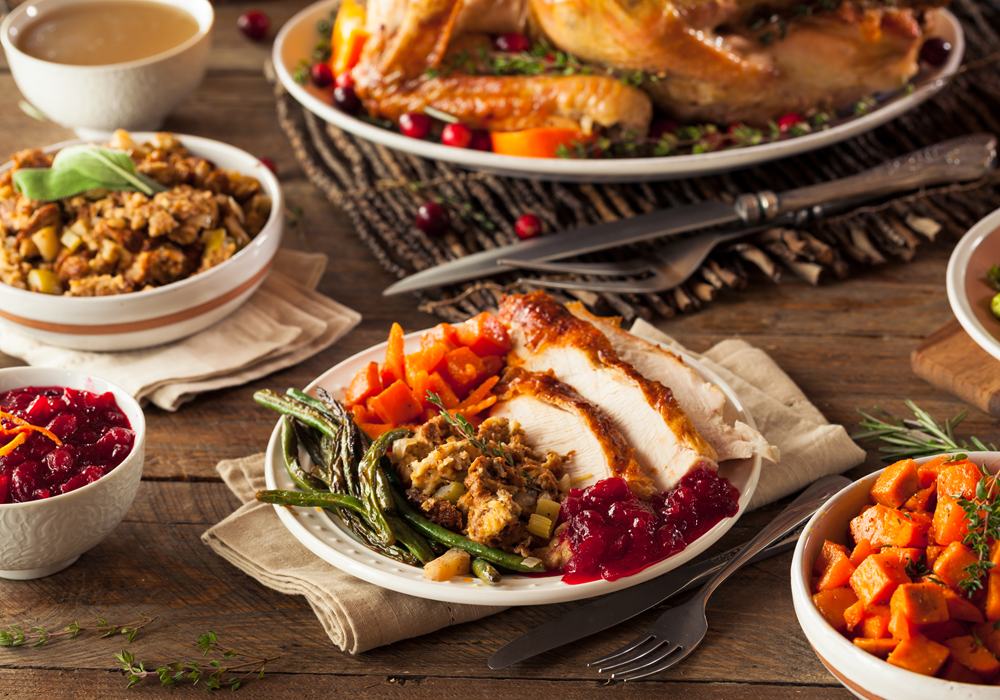 Table at Thanksgiving with classic dishes.