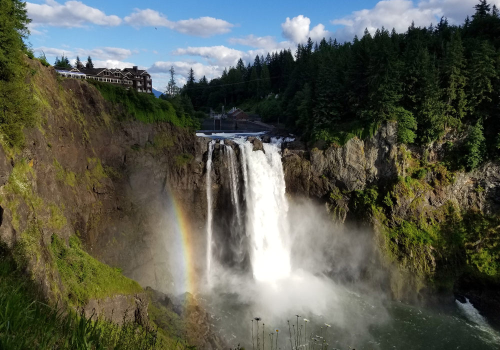 Snoqualmie Falls with a rainbow in Washington.
