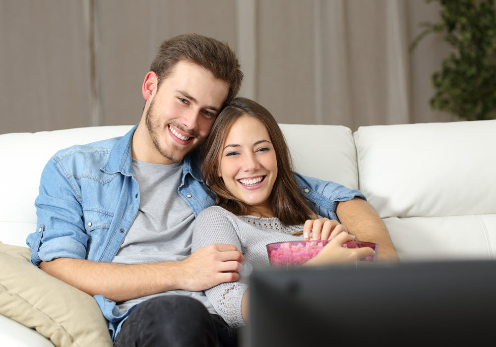 Couple having a Valentine's Day movie night.