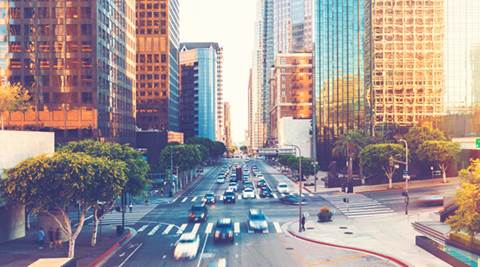 View of city and traffic at sunset.
