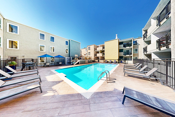 Swimming pool with lounge furniture.